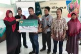 736.662 jiwa penduduk Kabupaten Tegal Terima KIS PBI