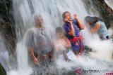 RITUAL MELUKAT DI DESA SEBATU