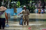 Banjir akibat curah hujan tinggi 