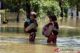 Banjir akibat curah hujan tinggi 