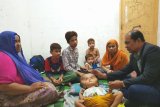 Garuda Indonesia di kuala lumpur kunjungi penderita hydrocephalus