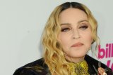 Ini tanggapan Madonna terkait tuduhan implan bokong