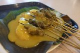 Lomba memasak sate khas Pariaman di festival Gandoriah