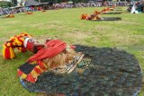 Penari reog bersiap menghibur penonton saat Gebyar Budaya Parade Reog Ponorogo di Lapangan Nambangan Kidul, Kota Madiun, Jawa Timur, Selasa (5/2/2019). Kegiatan tersebut untuk menjalin komunikasi dan silaturahmi antarseniman reog, sekaligus menghibur masyarakat. Antara Jatim/Siswowidodo/ZK