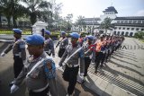 Ratusan Polisi Militer mengikuti Apel Operasi Gaktib dan Yustisi di Jalan Diponegoro, Bandung, Jawa Barat, Jumat (8/2/2019). Apel yang diikuti oleh ratusan Polisi Militer tersebut ditujukan dalam upaya pencegahan dan penindakan tegas serta penyelesaian upaya hukum bagi pelanggaran prajurit dan PNS TNI. ANTARA JABAR/Raisan Al Farisi/agr. 
