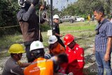 Seorang pekerja tewas tergantung di kabel tower Sutet Pulang Pisau