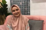 Kiat pilih busana muslim ala Ria Miranda