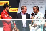 Vettel gagal juara karena penalti kontroversial, ini komentar Hamilton