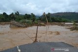 Fishing boats ply in inundated Morowali to transport people, goods