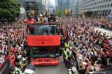 Luar biasa, kemeriahan perayaan kemenangan Raptors di pusat Kota Toronto