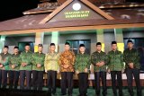 Menteri Agama Lukman Hakim Saifuddin bersama Gubernur Kalimantan Barat Sutarmidji, Wakil Gubernur Kalbar Ria Norsan, Walikota Pontianak Edi Rusdi Kamtono, Kapolda Kalbar Irjen Pol Didi Haryono, Pangdam XII/Tanjungpura Mayjen TNI Herman Asaribab, Danlanud Supadio Marsekal Pertama (Marsma) TNI Palito Sitorus dan Danlantamal XII Pontianak Laksma TNI Gregorius Agung W secara resmi membuka Seleksi Tilawatil Qur'an (STQ) Nasional XXV di Alun-Alun Sungai Kapuas, Pontianak, Kalimantan Barat, Sabtu (29/6/2019) malam. STQ Nasional XXV tersebut diikuti ratusan penghafal Al Quran se-Indonesia. ANTARA KALBAR/HO/Agung Widura/jhw