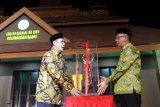 Menteri Agama Lukman Hakim Saifuddin bersama Gubernur Kalimantan Barat Sutarmidji, Wakil Gubernur Kalbar Ria Norsan, Walikota Pontianak Edi Rusdi Kamtono, Kapolda Kalbar Irjen Pol Didi Haryono, Pangdam XII/Tanjungpura Mayjen TNI Herman Asaribab, Danlanud Supadio Marsekal Pertama (Marsma) TNI Palito Sitorus dan Danlantamal XII Pontianak Laksma TNI Gregorius Agung W secara resmi membuka Seleksi Tilawatil Qur'an (STQ) Nasional XXV di Alun-Alun Sungai Kapuas, Pontianak, Kalimantan Barat, Sabtu (29/6/2019) malam. STQ Nasional XXV tersebut diikuti ratusan penghafal Al Quran se-Indonesia. ANTARA KALBAR/HO/Agung Widura/jhw