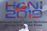 Gubernur Jawa Timur Khofifah Indar Parawansa memberikan sambutan saat peringatan Hari Anti Narkotika Internasional (HANI) 2019 di Taman Bungkul, Surabaya, Jawa Timur, Minggu (7/7/2019). Berbagai kegiatan digelar oleh Badan Narkotika Nasional Provinsi (BNNP) Jawa Timur dalam peringatan itu. Antara Jatim/Didik Suhartono/ZK