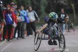 Pelajar berkebutuhan khusus bertanding pada nomor lari kursi roda 100 meter saat mengikuti ajang Olimpiade Olahraga Siswa Nasional (O2SN) SLB 2019 Tingkat Jawa Barat di GOR Pajajaran, Bandung, Jawa Barat, Selasa (23/7/2019). Sedikitnya 437 peserta siswa SLB se-Jawa Barat  mengikuti ajang 02SN yang bertujuan sebagai wadah pembibitan atlet muda sekaligus salah satu tahap seleksi untuk Pekan Olahraga Pelajar Nasional 2019 mendatang. ANTARA JABAR/Novrian Arbi/agr