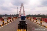 Load test the cable bridge stayed icon of Dharmasraya
