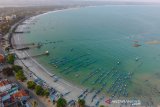 Foto udara lansekap kawasan wisata Pantai Pangandaran, Jawa Barat, Rabu (21/8/2019). Pemerintah Provinsi Jabar mempersiapkan untuk penataan Kabupaten Pangandaran menjadi destinasi wisata kelas dunia dan telah mendaftarkan 200 hektare lahan di Pangandaran untuk dijadikan Kawasan Ekonomi Khusus (KEK) dengan total nggaran Rp 80 miliar. ANTARA JABAR/Adeng Bustomi/agr