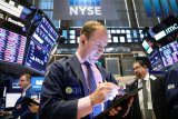Wall Street ditutup turun  tertekan kekhawatiran resesi dan data yang suram