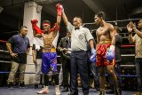 Ongen juara kelas bulu WBA Asian Boxing Council Continental