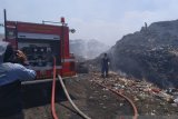Pemadaman terpadu dengan sistem sambonesia di TPA Antang Makassar