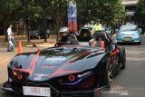 Mobil listrik Lewo Ireng mengaspal di kemacetan Jakarta