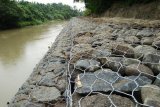 Desa Batumarta OKU bangun bronjong  dan saluran air antisipasi banjir