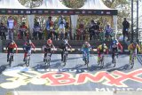 Pebalap sepeda BMX kategori Women Elite beradu cepat pada kompetisi Banyuwangi BMX Intenational 2019 di Sirkuit BMX Muncar, Banyuwangi, Jawa Timur, Minggu (27/10/2019). Kompetisi BMX dengan klasifikasi Hors Class (HC) itu, merupakan ajang bergengsi untuk menentukan kualifikasi olimpiade 2020 di Tokyo. Antara Jatim/Budi Candra Setya/zk.