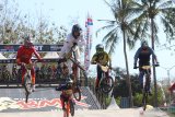 Pebalap sepeda BMX kategori Junior Men beradu cepat pada kompetisi Banyuwangi BMX Intenational 2019 di Sirkuit BMX Muncar, Banyuwangi, Jawa Timur, Minggu (27/10/2019). Kompetisi BMX dengan klasifikasi Hors Class (HC) itu, merupakan ajang bergengsi yang diikuti pebalap dari berbagai negara untuk menentukan kualifikasi olimpiade 2020 di Tokyo. Antara Jatim/Budi Candra Setya/zk.