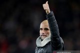 Dikabarkan kembali ke Bayern Munchen, Pep Guardiola akui masih senang di City