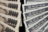 Mata uang Yen jatuh ke level terendah