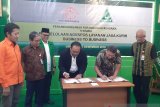 Pos Indonesia kerja sama dengan GP Ansor
