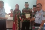 Seorang warga  binaan Rutan Baturaja  menikah di balik jeruji besi