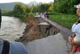 Jalan amblas, Padang Pariaman akan mengalihkan jalan terban di Batang Anai