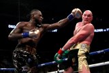 Wilder pensiun jika Fury membuktikan sesumbarnya
