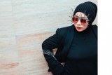 Alasan Melly Goeslaw larang follower pamer foto menu buka dan sahur