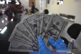 Rupiah melemah terhadap dollar di posisi Rp15.712