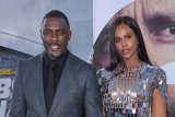 Selalu dampingi suami, istri Idris Elba terjangkit corona