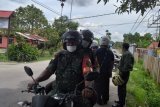 TNI-polisi di Sentani Papua keliling kampung imbau warga cegah Covid-19