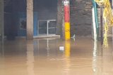 Jakarta banjir lagi,  Kali Ciliwung meluap merendam Kebon Pala hingga satu meter
