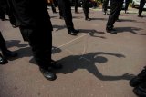 Polisi olahraga dan berjemur