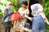Komunitas Jurnalis salurkan bantuan masker dan bahan pokok di Makassar