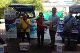 SP BPJAMSOSTEK Cabang Makassar bagikan bahan pokok