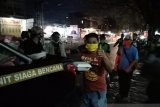 Dinas Sosial-Tagana Manado salurkan makanan siap saji bagi sopir