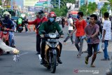 Pemberlakuan wajib pakai sarung tangan di Makassar