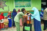 Persit KCK Kodim 1702/Jayawijaya bagi sembako di panti asuhan l Istiqomah Walesi