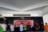 Alfamidi bantu bagikan ribuan paket sembako di Manado