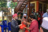 Pemerintah Kabupaten Minahasa salurkan bantuan pangan di 33 masjid