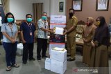 WVI bantu 4.500 masker medis ke Pemda Tojo Unauna