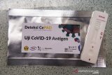 Alat deteksi cepat atau Rapid Test CePAD Antigen diperlihatkan di Pusat Riset Bioteknologi Molekular dan Bioinformatika Universitas Padjadjaran, Bandung, Jawa Barat, Kamis (21/5/2020). Universitas Padjadjaran bekerja sama dengan Tekad Mandiri Citra dan Pakar Biomedika Indonesia menciptakan dan memproduksi Rapid Test CePAD Antigen guna mendeteksi keberadaan virus dalam penanganan COVID-19 atau penyakit infeksi lainnya. ANTARA JABAR/M Agung Rajasa/agr