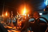 Merayakan TradisiTumbilotohe di Kampung Halaman