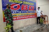 Babinsa di Sangihe bantu siapkan rumah singgah bagi pelaku perjalanan